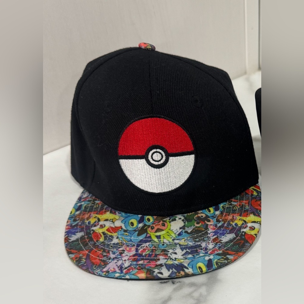 YOUTH POKÉMON MULTICHARACTER POKÉBALL SNAPBACK HAT CAP